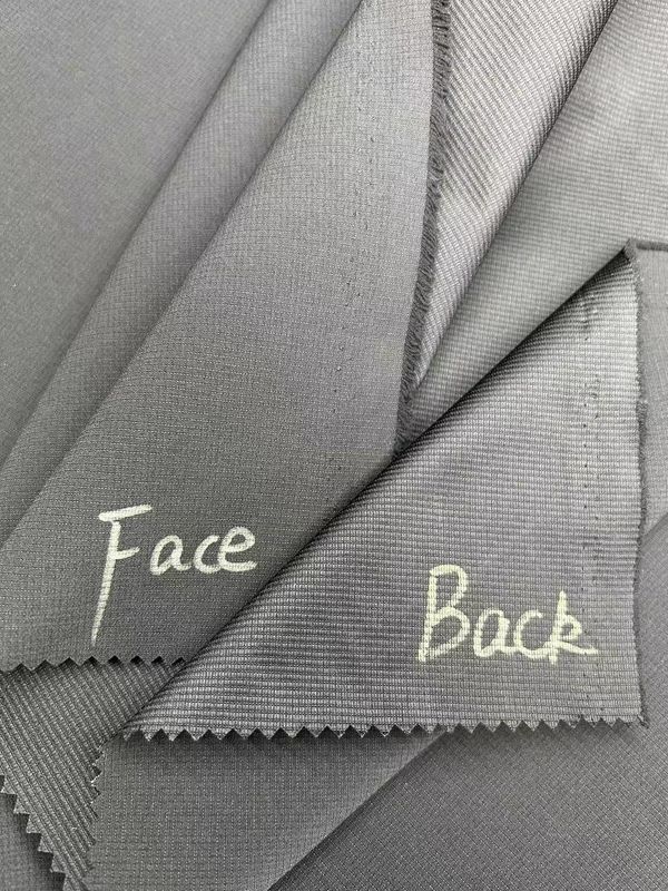 Tejido texturizado de jacquard a rayas de poliéster 100% para chaquetas pantalones ropa deportiva