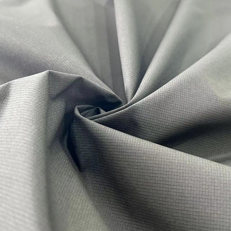 Tejido texturizado de jacquard a rayas de poliéster 100% para chaquetas pantalones ropa deportiva