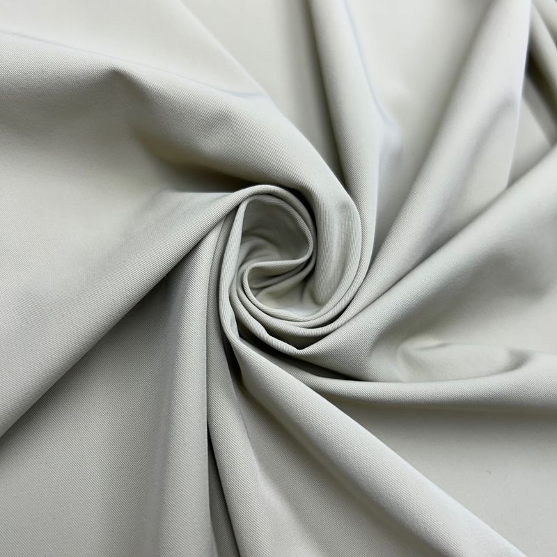 Tejido de nylon blando de cuatro vías 70D+40D*70D+40D 90% de nylon 10% de spandex 170GSM