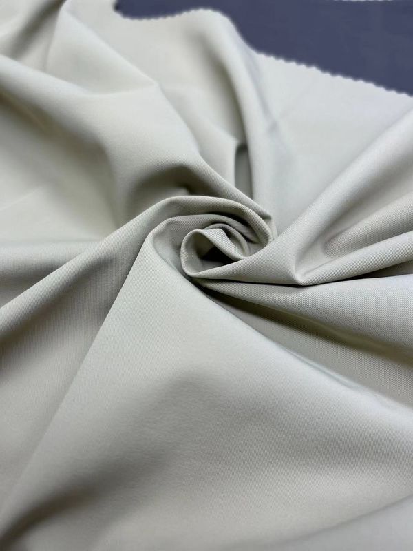 Tejido de nylon blando de cuatro vías 70D+40D*70D+40D 90% de nylon 10% de spandex 170GSM