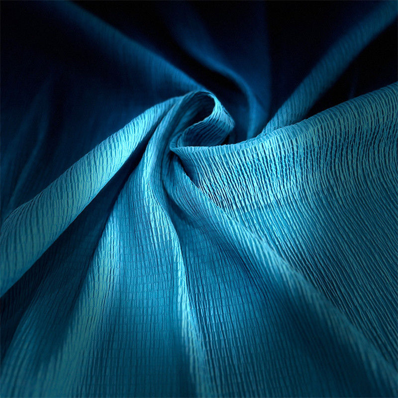 Tejido crepe de punto de burbuja 96GSM 97% Nylon 3% Spandex para faldas camisas