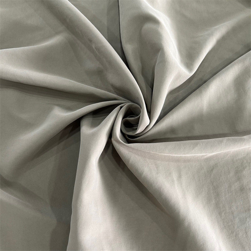 Tricot cepillado de tela de nylon suave 70D * 160D 100GSM para bañadores y pantalones cortos de playa