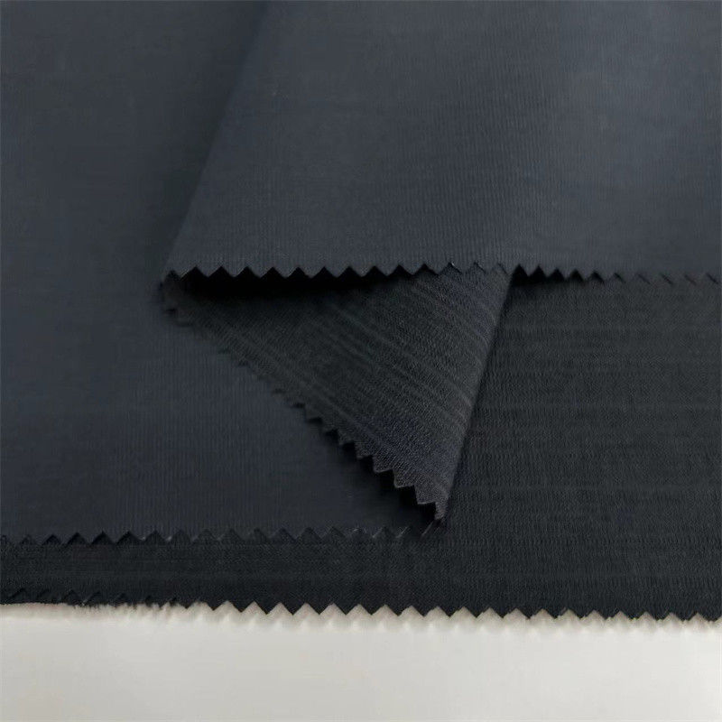 Tejido de poliéster reciclado de Seersucker de baja estiradura T400 con textura similar al lino para ropa de exterior