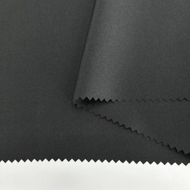 Tejido de tejido de punto de poliéster de resorte 150D 150D*150D+40D 98% Poliéster 2% Spandex 166GSM