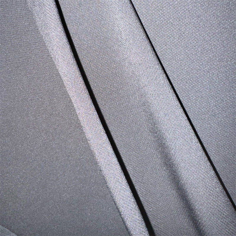Tejido de estiramiento de poliéster Jacquard de cuatro vías 50D+20D*50D+20D 119-127GSM 92% Poliéster 8% Spandex 57