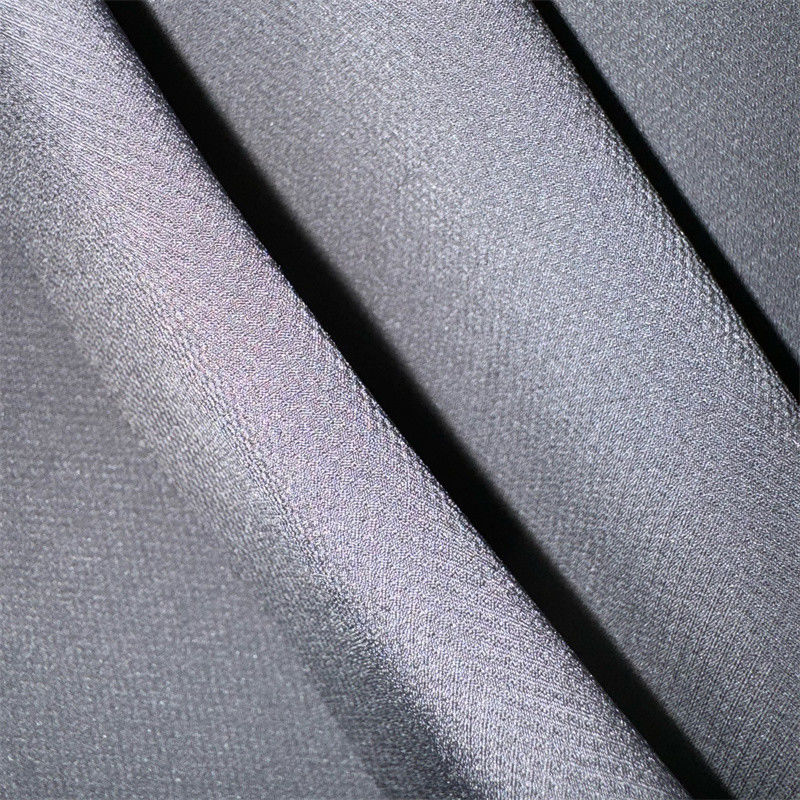 Tejido de estiramiento de poliéster Jacquard de cuatro vías 50D+20D*50D+20D 119-127GSM 92% Poliéster 8% Spandex 57