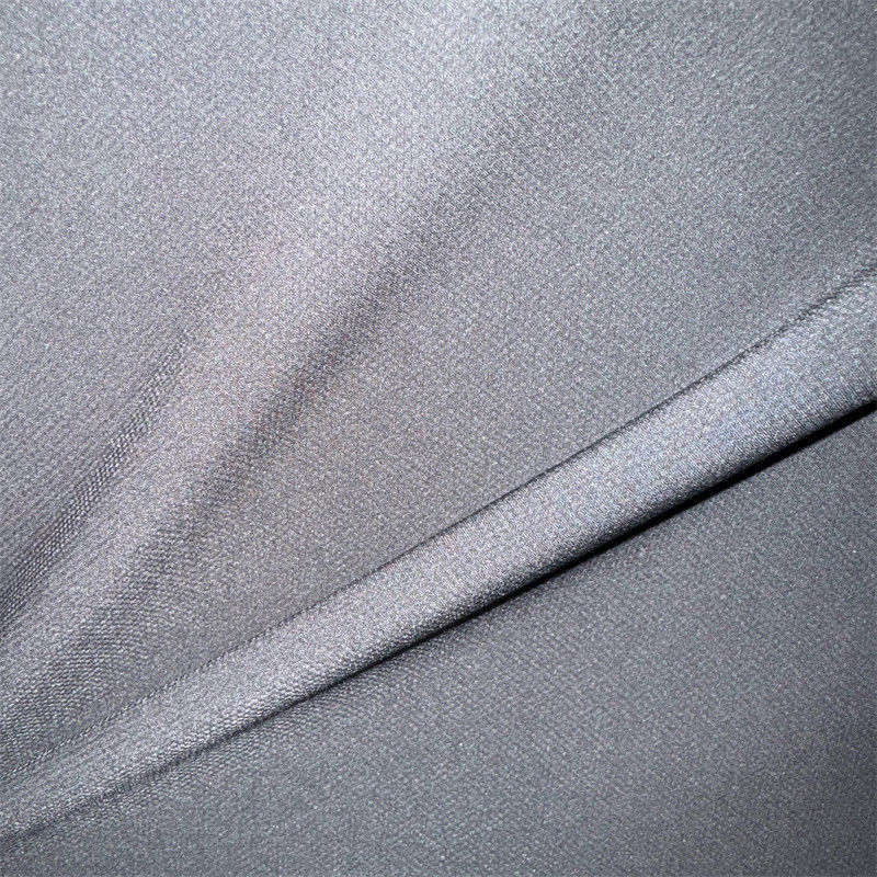 Tejido de estiramiento de poliéster Jacquard de cuatro vías 50D+20D*50D+20D 119-127GSM 92% Poliéster 8% Spandex 57