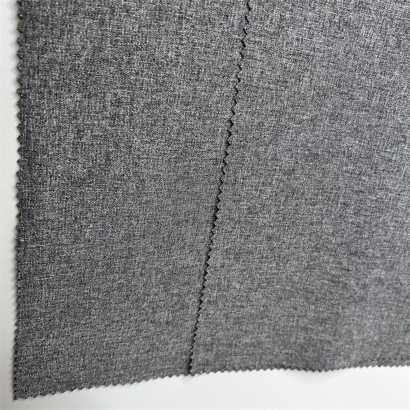 Filamento de poliamida reciclado Spandex 2/2 Tejido de twill variable con cuatro vías de estiramiento Vestidos activos Ropas faldas
