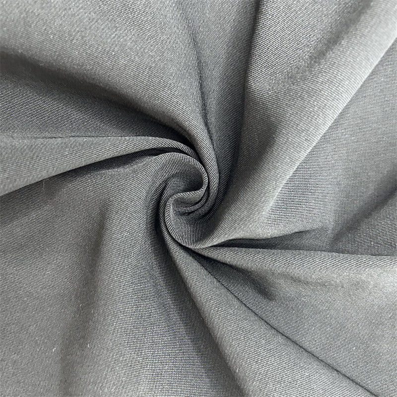 Tela de algodón de seda fría T800 Twist 100% de poliéster reciclado para chaquetas abrigos pantalones pantalones