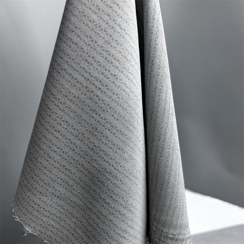 Tejido de montaña triangular de doble tono de cuatro vías con pantalones de poliéster catiónico camisas blusas