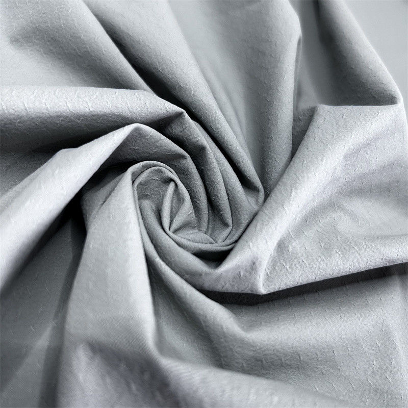 70D+40D*70D+40D Efecto Jacquard de Twill tridimensional para camisas chaquetas delgadas