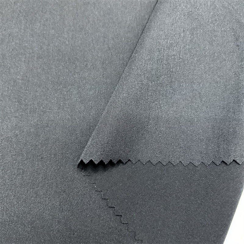 75D2/1 Twill Tejido elástico de cuatro lados Material cómodo y elástico
