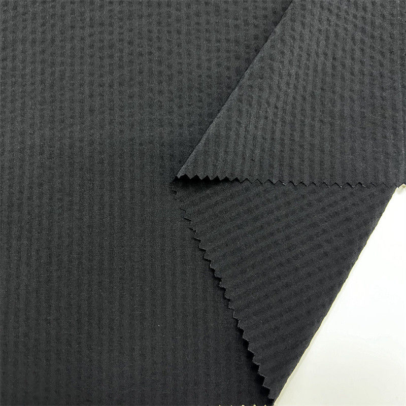 70D Nylon Cuatro lados de burbuja elástica de banda vertical de tejido de spandex 70D+70D+40D*70D+40D La superficie tiene una textura abultada parecida a una burbuja