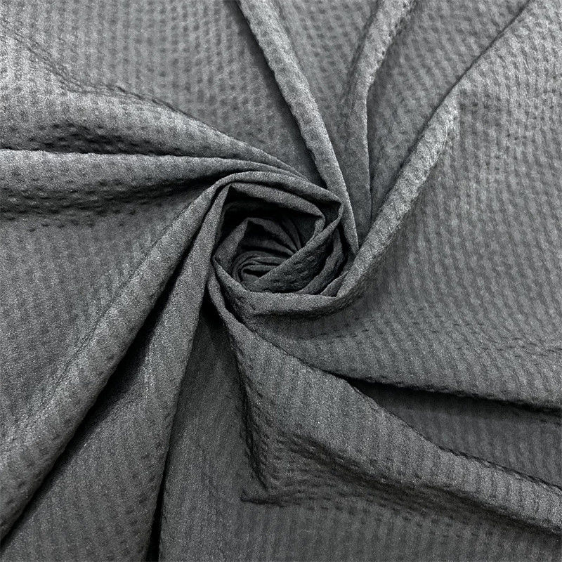 70D Nylon Cuatro lados de burbuja elástica de banda vertical de tejido de spandex 70D+70D+40D*70D+40D La superficie tiene una textura abultada parecida a una burbuja