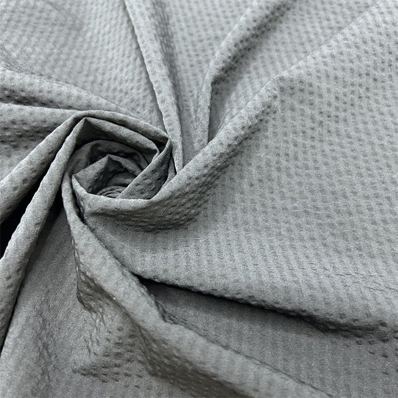 70D Nylon Cuatro lados de burbuja elástica de banda vertical de tejido de spandex 70D+70D+40D*70D+40D La superficie tiene una textura abultada parecida a una burbuja
